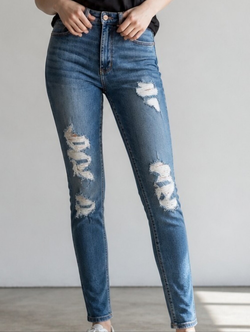 AEO High Rise Distressed Skinny Jeans in Light Blue